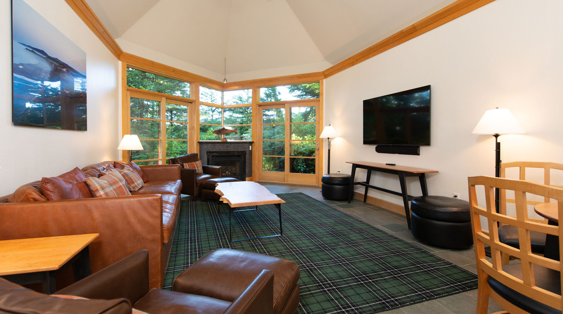The warm living room area of a Grove cabin